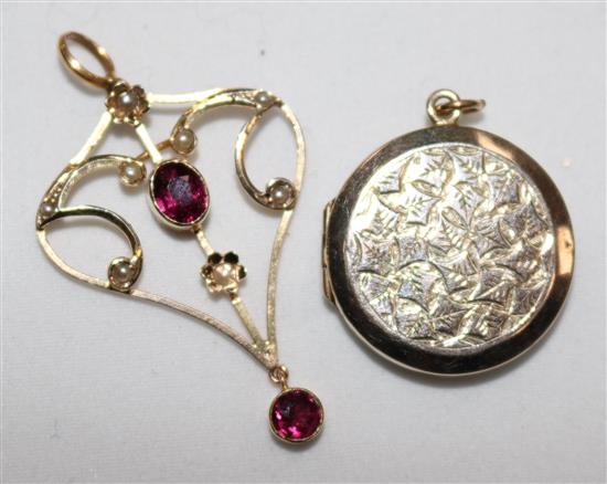 An Edwardian 9ct gold, garnet and seed pearl set pendant and an engraved gold locket.
